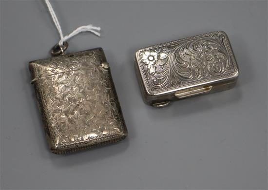 A Continental silver engraved patch box and a silver vesta case.
